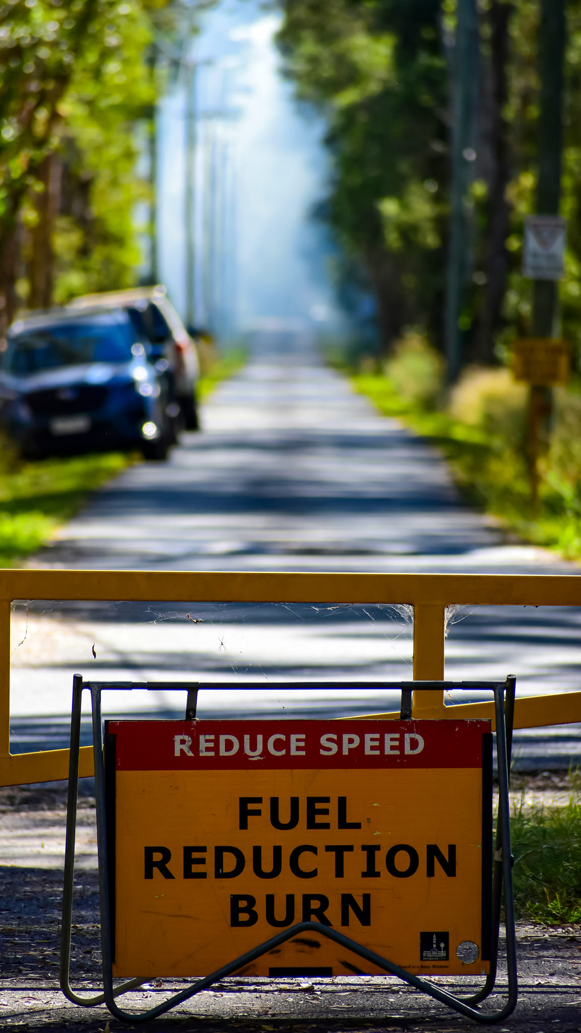 Reduce speed sign